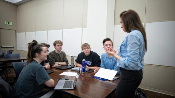 Small group of students in class in Lewis Hall